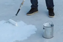 Waterproofing chemical application on concrete roof surface